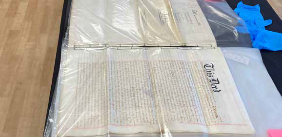 Plastic covered archive document titled 'This Deed'